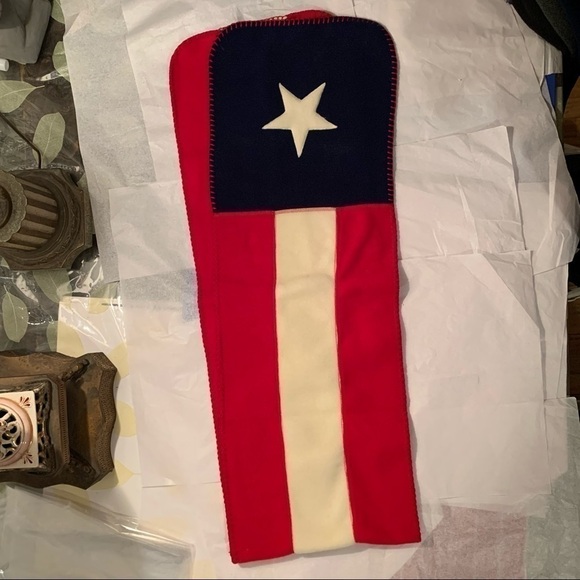 The flag scarf is cozy and soft to the touch. - Picture 2 of 13